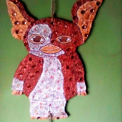 "Las 3 Reglas del Mogwai . 1) No exponerlo a la luz brillante (en especial a la luz solar)